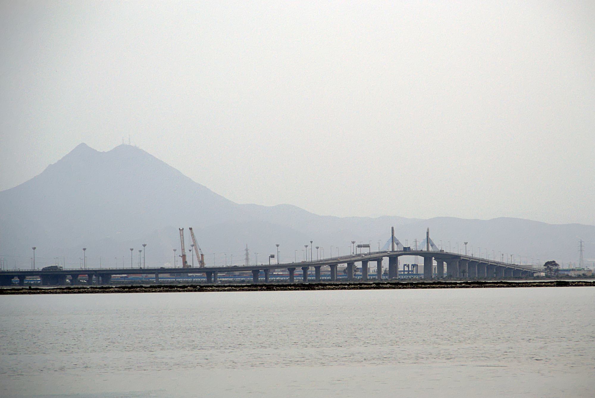 Radès–La Goulette bridge, Tunisia, with Boukornine mountain in the haze